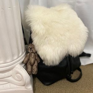 Pebbled Faux Leather Black backpack with Fur Flap